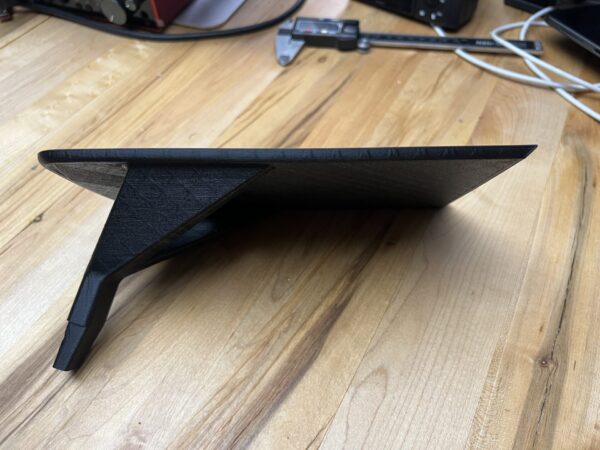BMW i3 accessory that creates a hidden compartment and shelf under the armrest - Image 5